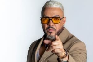 Belo deixa desentendimento no passado e celebra ida de Denilson para a Globo